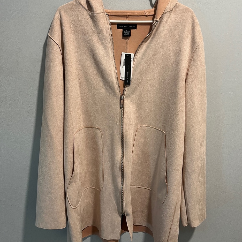 A Faux Leather jacket. It is a petal pink color and a size XL.